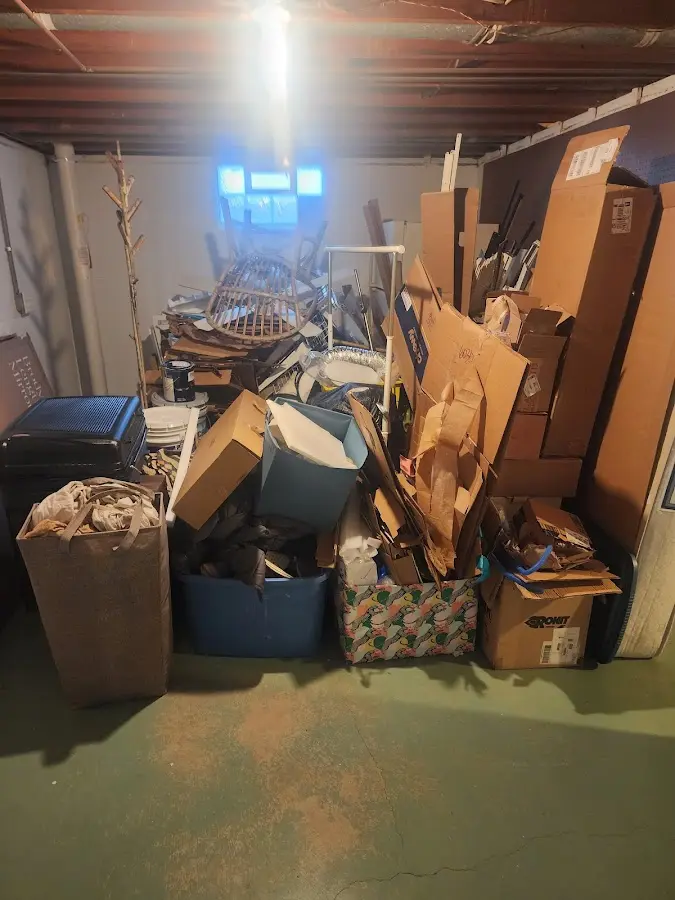 Roll-off dumpster container at job site for 4 Yard Dumpster Rental in Grove